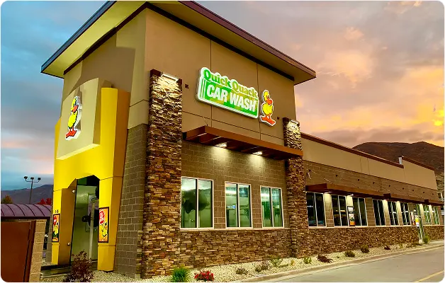 Quick Quack store at dusk